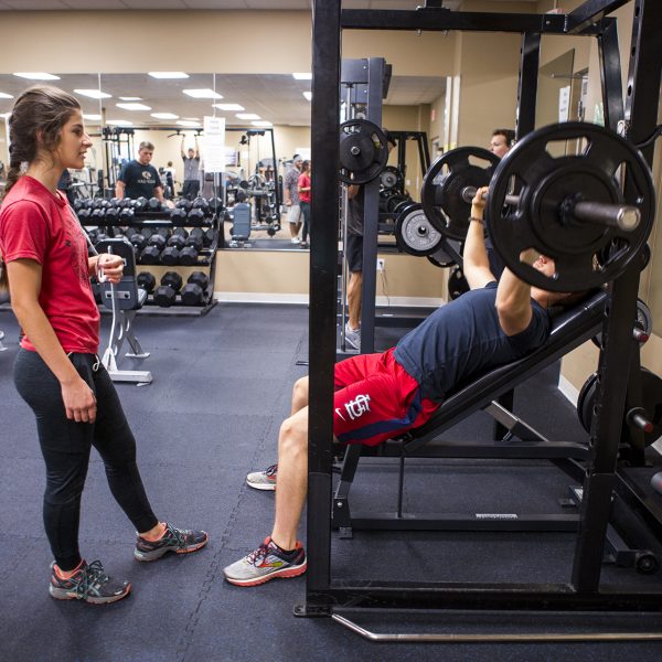 Students working out in the fitness center.