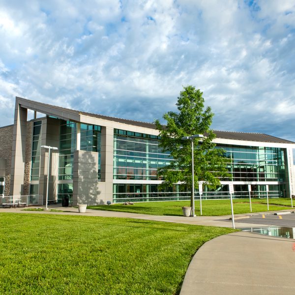 OTC Richwood Valley Campus with dramatic clouds and blue sky above.