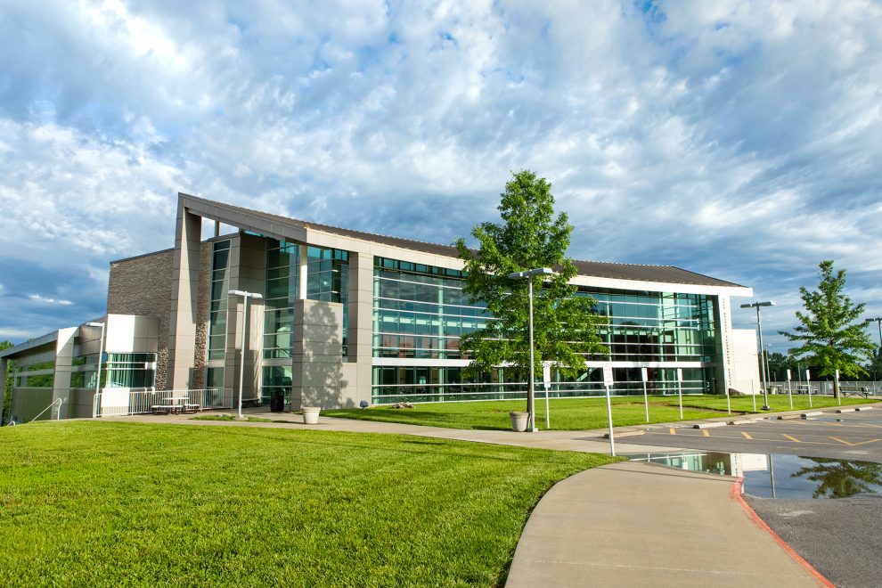 OTC Richwood Valley Campus with dramatic clouds and blue sky above.