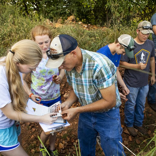 Students in the Plant Science Program study soil samples.
