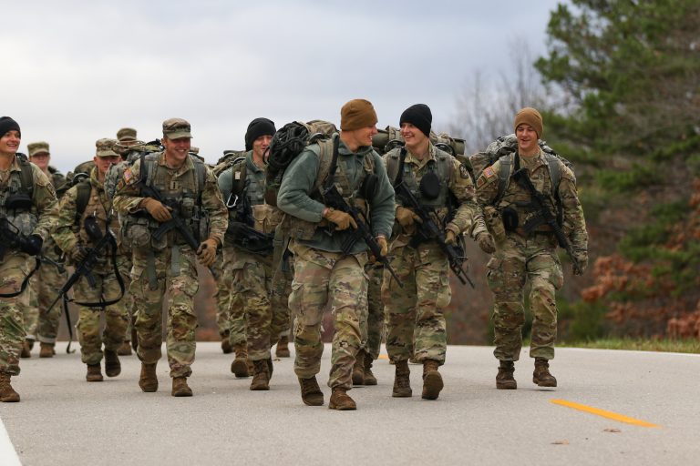 Cadets from Missouri State University ruck between round robin events on day two of the 3rd Brigade Army ROTC Ranger Challenge, Nov. 5, at Fort Leonard Wood, Mo. The round robin included five events, functional fitness, one rope bridge, weapons assembly and disassembly, call for fire and HMMWV push and a medical lane. | Photo by Amy Turner, U.S. Army Cadet Command Public Affairs